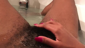 Masturbating my hairy pussy in the tub. JUICY