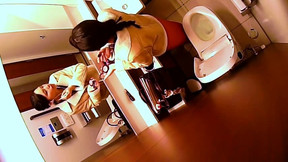 Amateur Japanese babes caught peeing on hidden camera