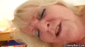 Horny, Czech granny in black stockings is riding a rock hard cock of a younger guy