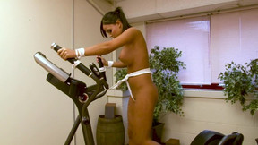 Super nice brunette tied to exercise machine with a vibe with run until orgasm!!