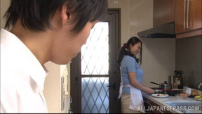 A very good Japanese wife cooks him dinner and gives a handjob
