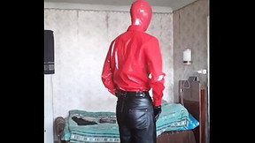 In leather pants and red PVC shirt