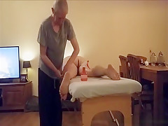 Old guy massages a big ass milf on the table