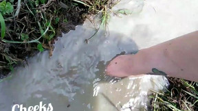 Bare feet in mud