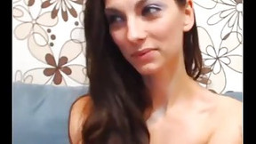 Small titted brunette is about to experience an orgasm in front of the web camera