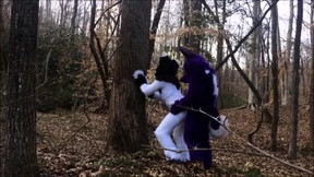 Kinky lovers in funny costumes enjoy doggystyle sex outside