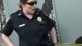 Two cock hungry female cops get their wet vaginas fucked by a handsome black felon