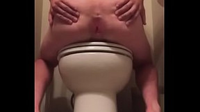 showing ass in a public bathroom