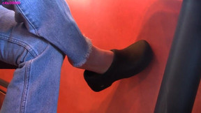 Restaurant worker barefoot shoeplay