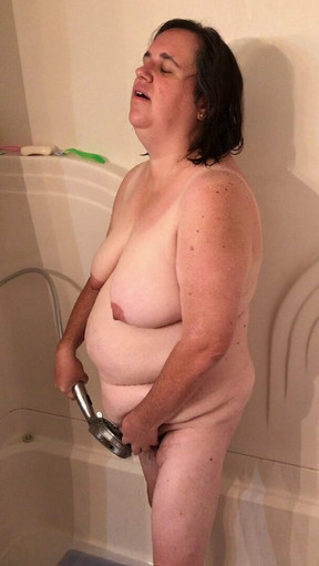 Naomi takes a shower