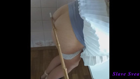 Spanking bare butt with bamboo