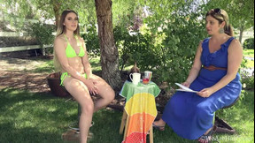 Niki Snow gets interviewed outdoors in her bikini