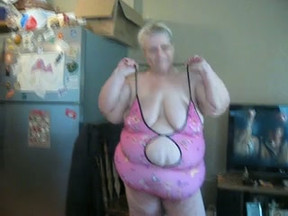 Filthy mature white BBW lady in pink jumbo sized bathing suit