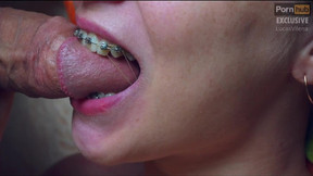 Hot teen with braces do blowjob and recieve cum in mouth