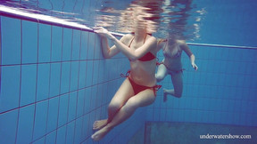 Hot Marusia and Melisa Darkova underwater lesbos