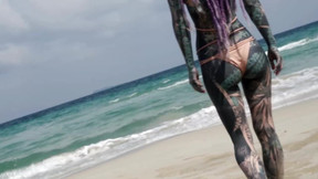 Heavily tattooed dreadlocks Anuskatzz holiday ocean tease with Lily Lu