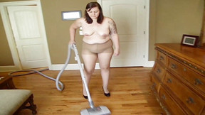 She is vacuuming in pantyhose